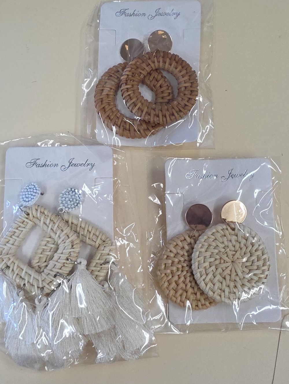 Fashion Jewelry Cream Woven Tassel earrings. Set Of 3 ALL $5.00  2 FOR $7.00